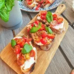 Bruschetta with cherry tomatoes and fresh basil