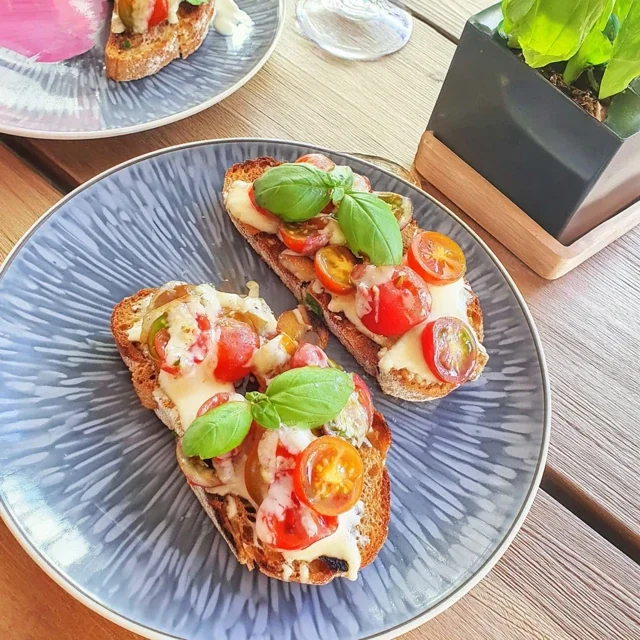 Bruschetta with cherry tomatoes and fresh basil