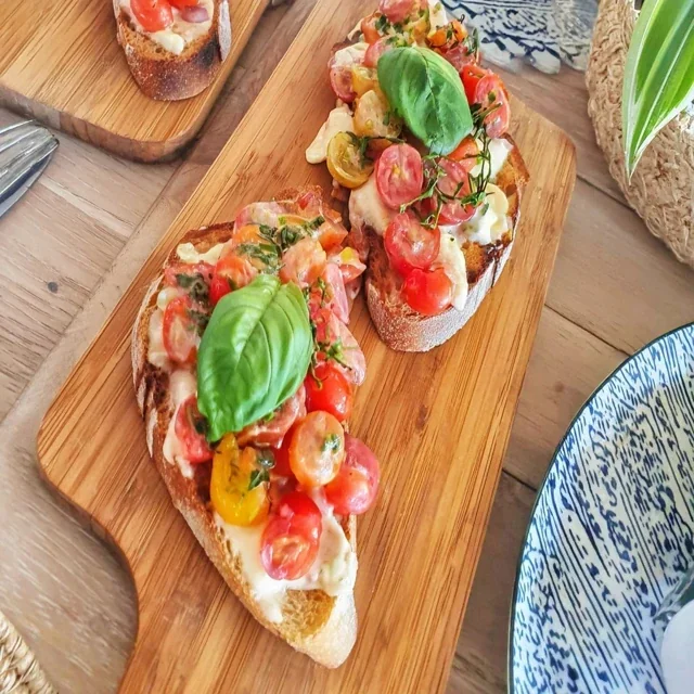 Bruschetta with cherry tomatoes and fresh basil